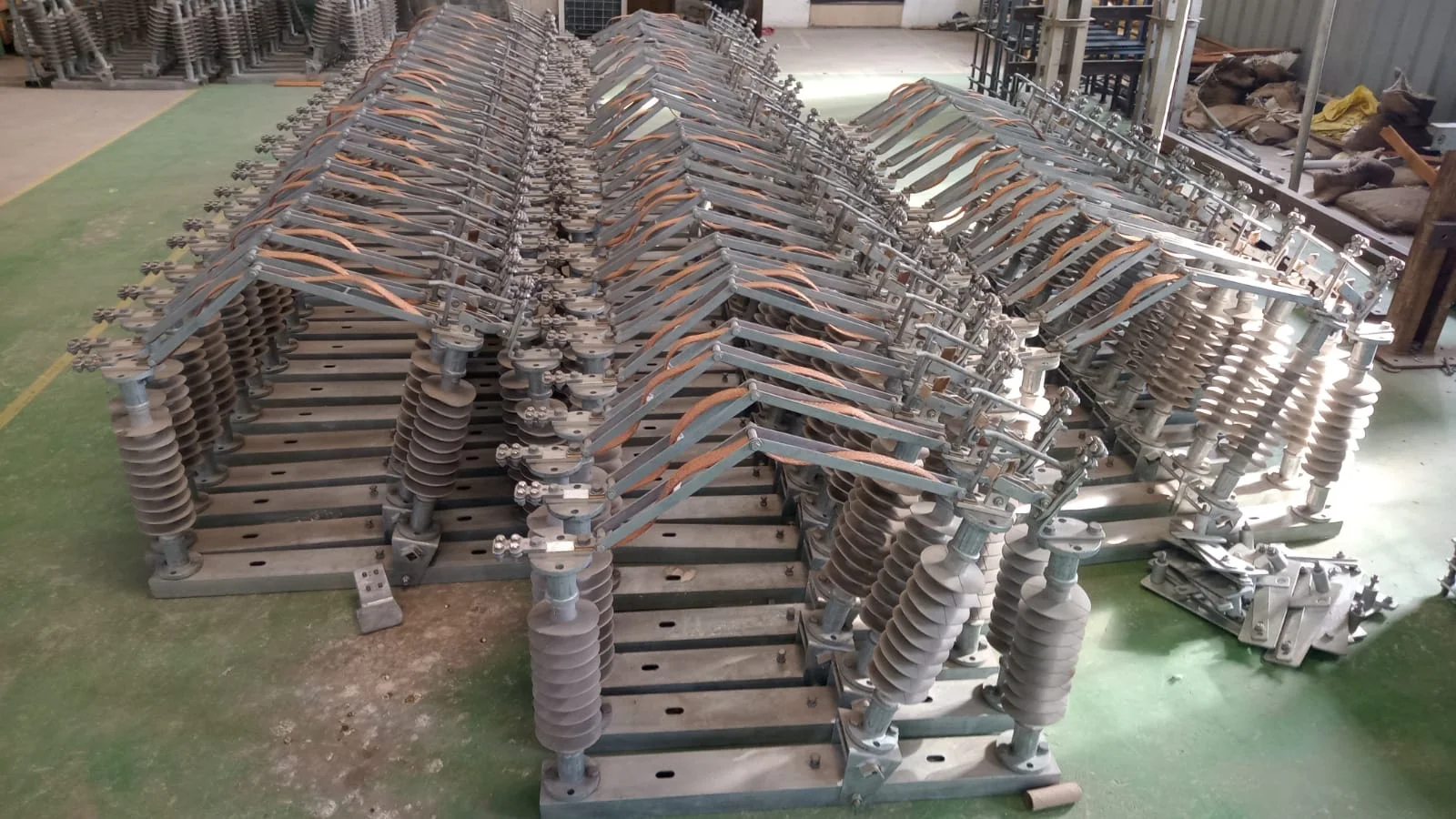 Rows of electrical disconnectors in an industrial workshop